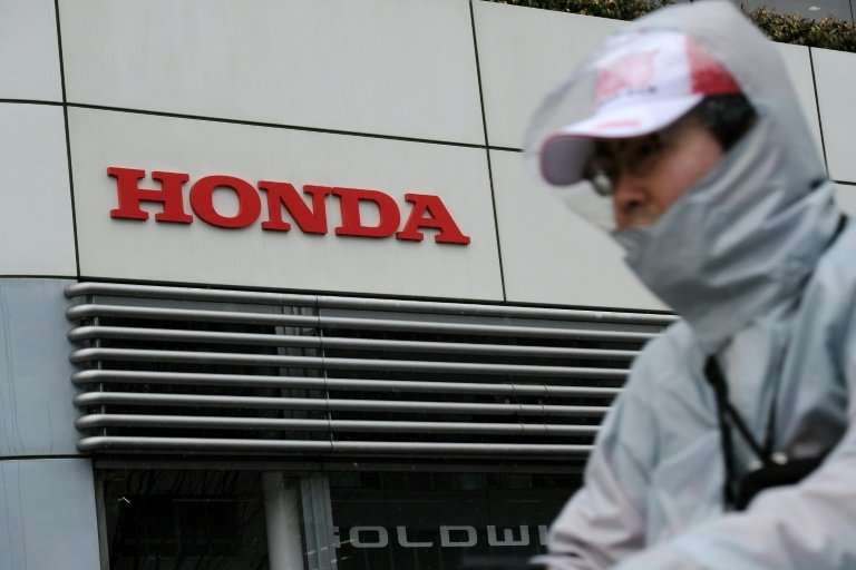 Japan's Honda Motor has revised up net profit and sales forecasts