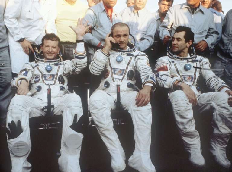 Jean-Loup Chretien (L) became the first Frenchman and Western European in space when he flew to Salyut 7 in 1982