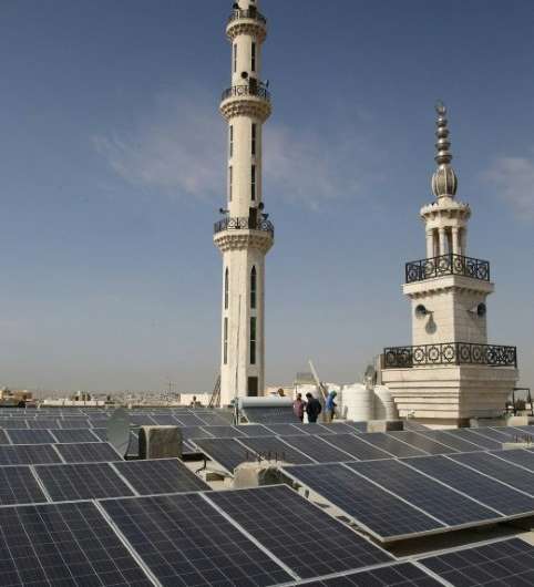 Jordanians hope solar panels like these on a mosque in Amman will help the country reduce its reliance on imported fossil fuels