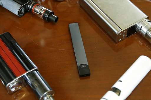 Juul halts store sales of some flavored e-cigarettes