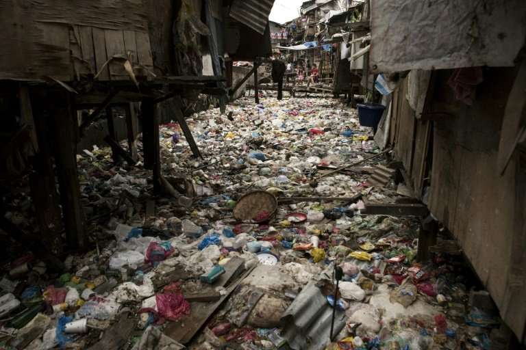 Manila authorities say the trash-choked creek is a breeding ground for illnesses like cholera and typhoid fever