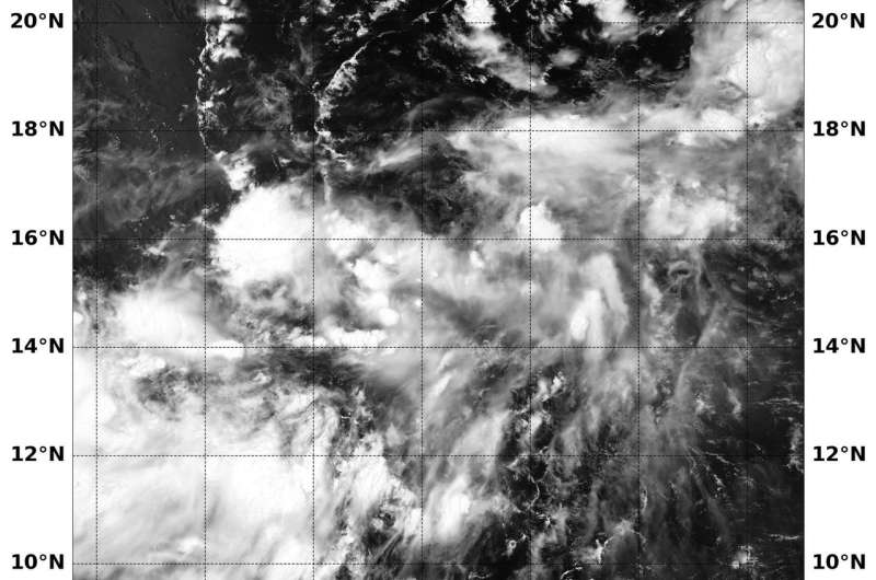 NASA finds an ill-defined Tropical Depression 15W getting organized