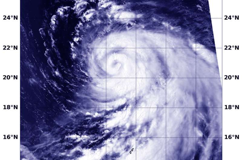 NASA sees the spiraling in Typhoon Cimaron