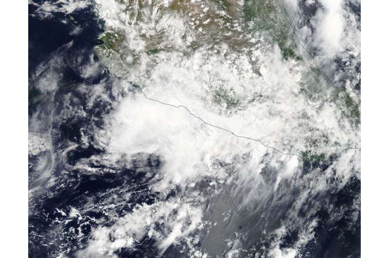 NASA's Terra satellite sees Tropical Depression Carlotta weakening over Mexico