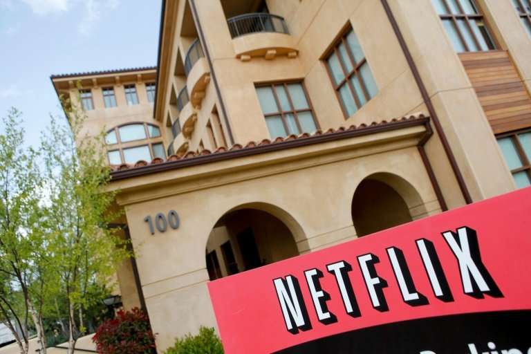 Netflix reported strong gains in profits and subscribers in what it called a &quot;beautiful&quot; fourth quarter