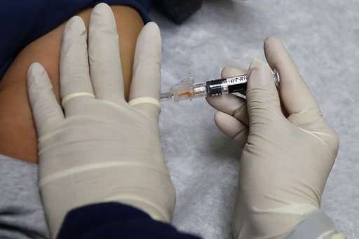 New flu vaccine works a little better than traditional shot
