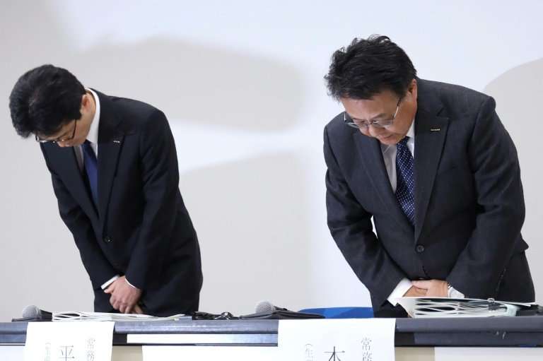 Nissan vice president Seiji Honda (R, with vice president Teiji Hirata) says the company will work hard to regain trust
