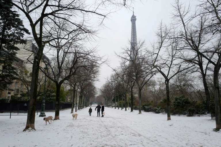Paris awoke under a blanket of snow