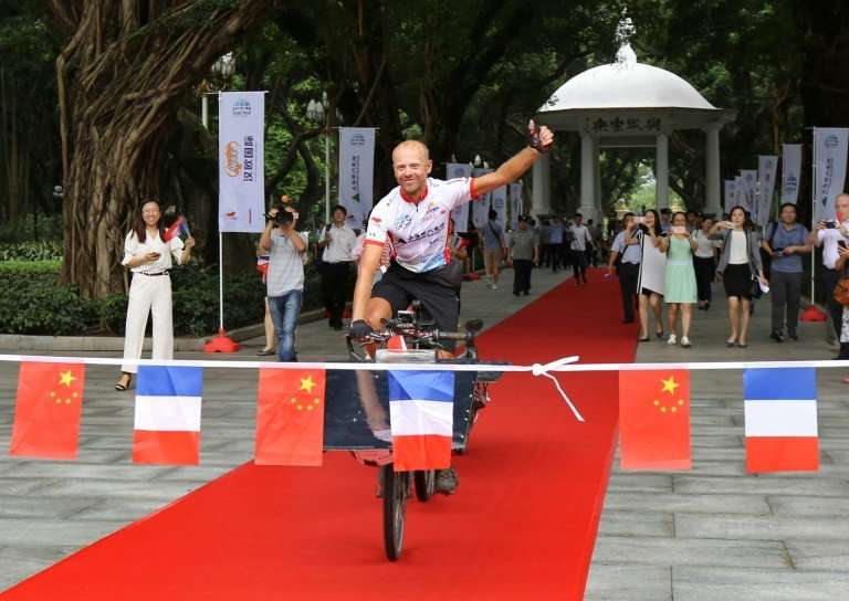 Raf van Hulle took just 49 days to complete the 12,000 kilometre journey from the French city of Lyon to Guangzhou in southern C