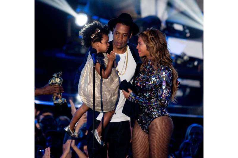 Rapper Jay-Z and singer Beyonce, pictured in 2014 with their daughter Blue Ivy Carter, marry their two musical styles on a surpr