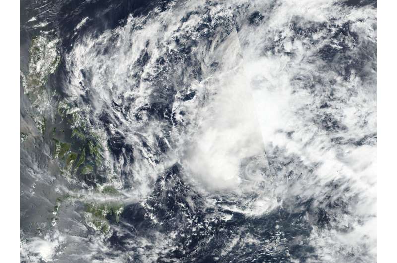 Satellite finds southerly wind shear affecting Tropical Depression Jelawat