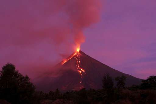 Significant ash falls near erupting Philippine volcano