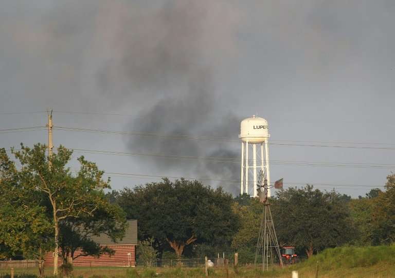 Smoke rises from the Arkema chemical manufacturing and storage facility that burst into flames after Hurricane Harvey's floodwat