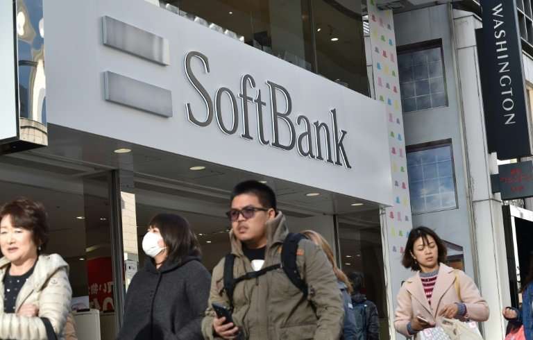 SoftBank said overall sales rose on the robust performance of key operations including its domestic telecom business, Yahoo Japa
