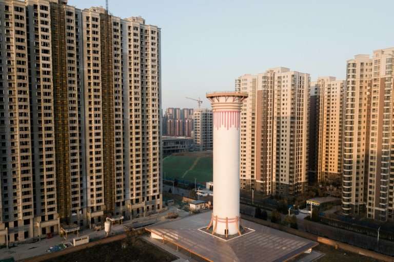 Standing between high-rises, the giant air purifier is capable of cleaning between 5 million and 18 million cubic meters of air 