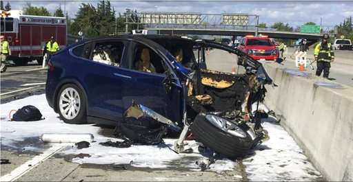 Tesla: Crash was worsened by missing freeway barrier shield