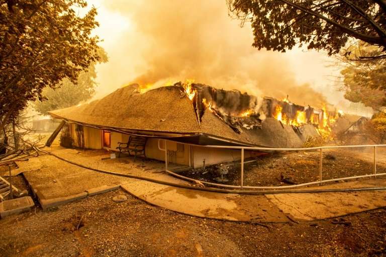 The Feather River Hospital burns down during the Camp fire in Paradise, California on November 8, 2018