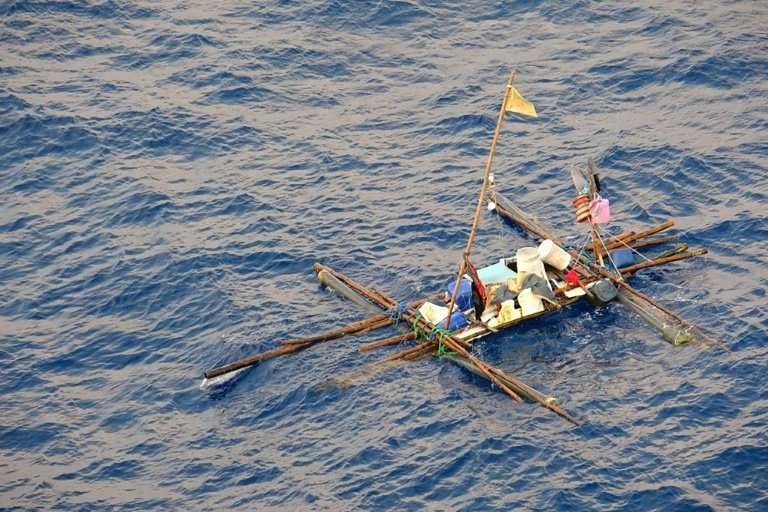 The fishermen cobbled together a makeshift raft after a marlin sank their boat