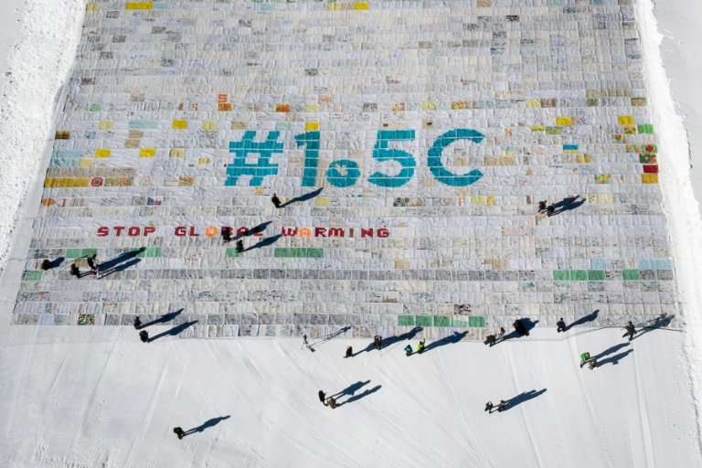 The mosaic of postcards, measuring 2,500 square metres (26,910 square feet), was laid out in the snow on the Aletsch glacier in 