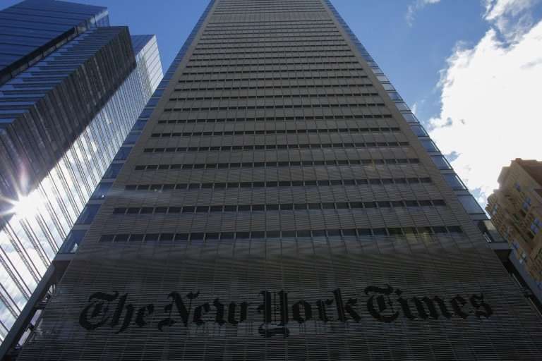 The New York Times added more digital subscriptions in the fourth quarter but swung to a loss on one-time charges