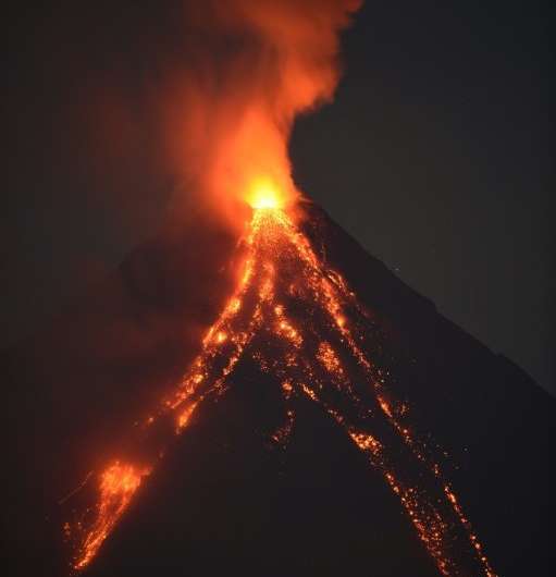 The Philippines' Mayon volcano spews lava ash from its crater during an eruptionon January 30, 2018.