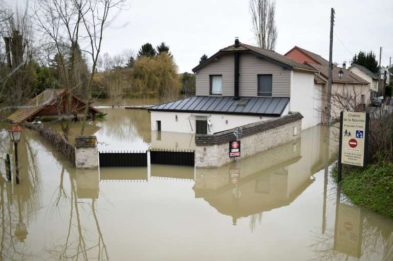 There's plenty of mopping ahead for residents of illennes-sur-Seine, west of Paris