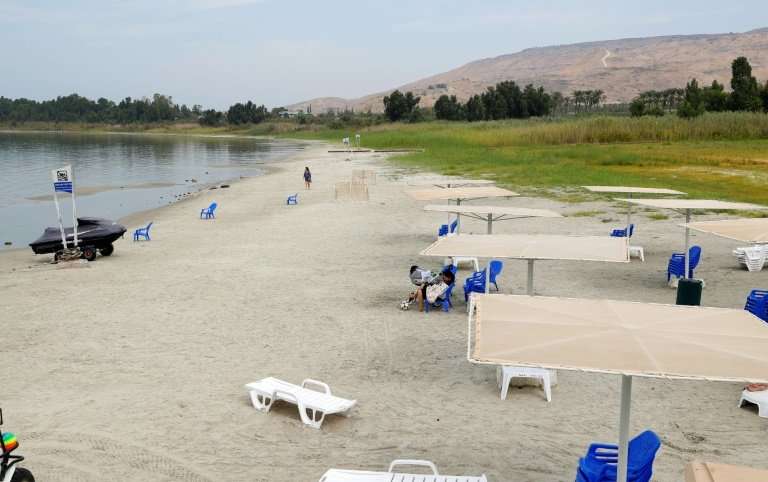 The Sea of Galilee has been shrinking for years, leading to the appearance of sandy spots at the water's edge
