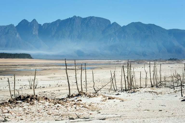 The Theewaterskloof Dam, one of Cape Town's major sources of water, is now a landscape of sand and desiccated tree trunks