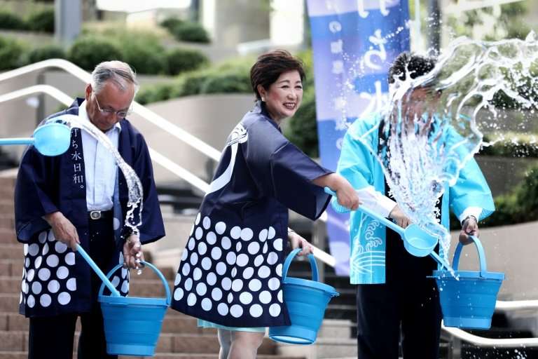 The Tokyo government has encouraged the traditional Uchimizu ceremony, where water is splashed on the ground, as part of its sum