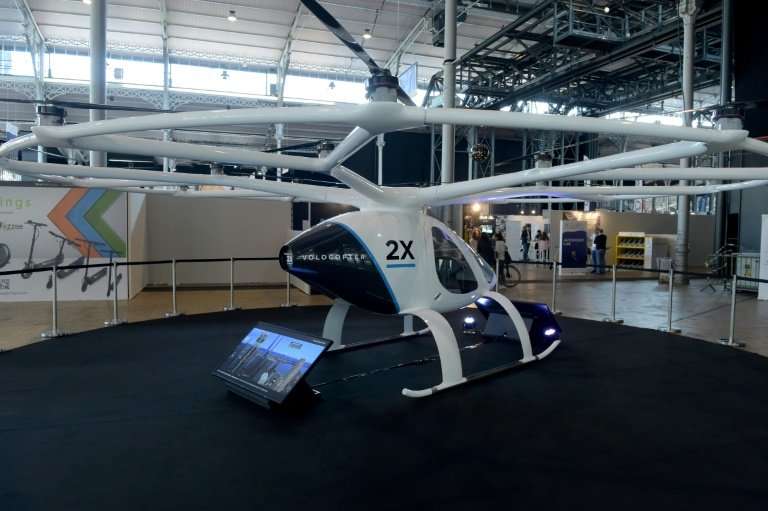 The Volocopter electric air taxi takes off and lands vertically and can carry two passengers for around 30 kilometres (19 miles)