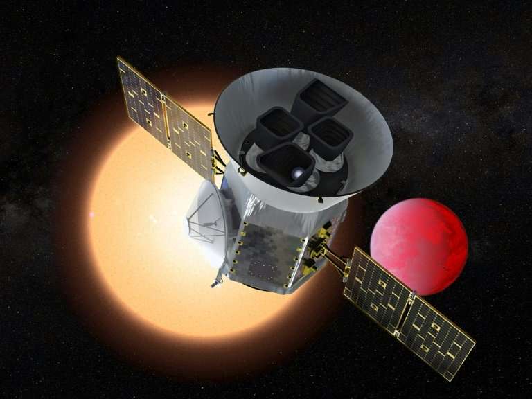 This NASA handout artist's rendition shows the Transiting Exoplanet Survey Satellite (TESS), a NASA Explorer mission launching i