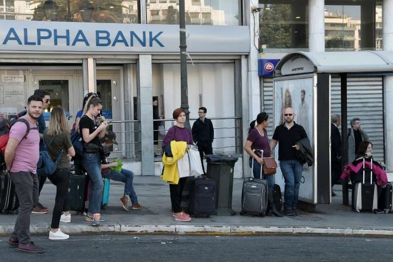Tourists faced a wait for airport buses in central Athens during a strike by taxis and suburban