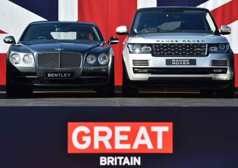 Two British built-cars, a Bentley Flying Spur and a Range Rover, pictured in London in 2015
