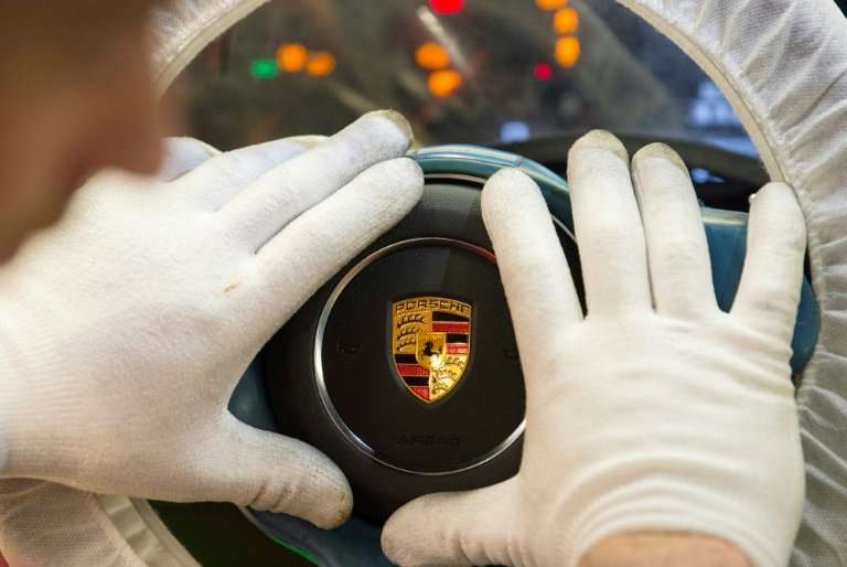 Two top Porsche executives and an ex-employee are being probed in connection with the &quot;dieselgate&quot; scandal
