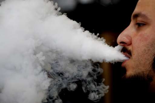 UK lawmakers urge government to relax rules on e-cigarettes