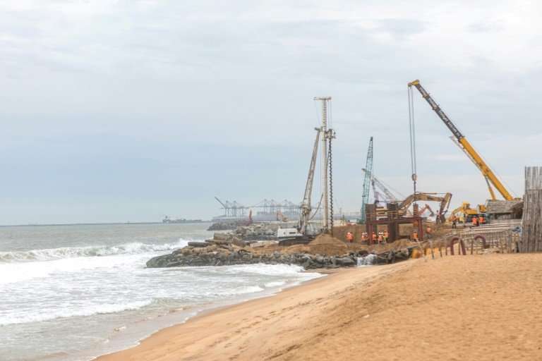 Villagers living along Togo's shoreline say construction of a new deep water port in Lome has stept up the pace of the coastal e