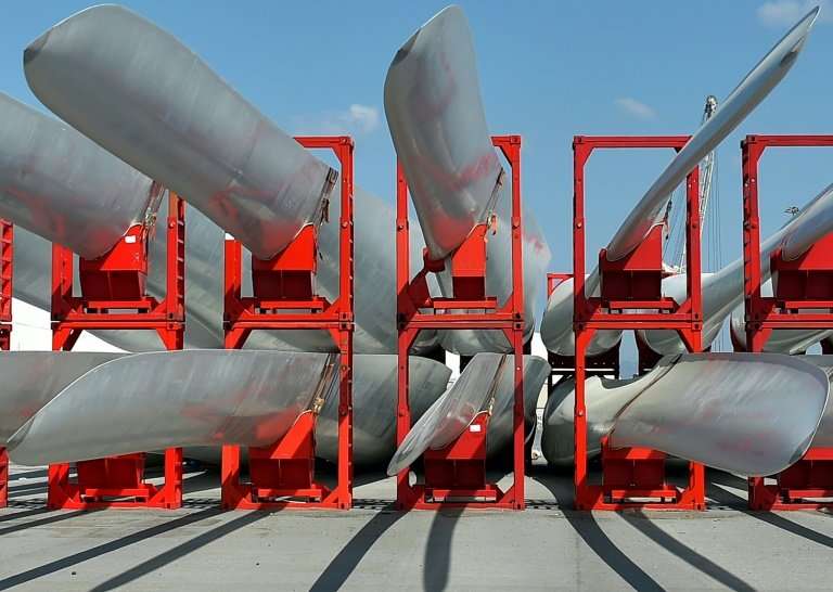 Wind turbine blades stored at Haizea Wind Group's headquarters at Bilbao's harbour. Spanish wind power firms are fighting to hol