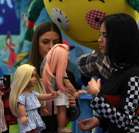 With traditional toy companies torn between joining kids in the digital world or coaxing them away from their screens, AFP takes