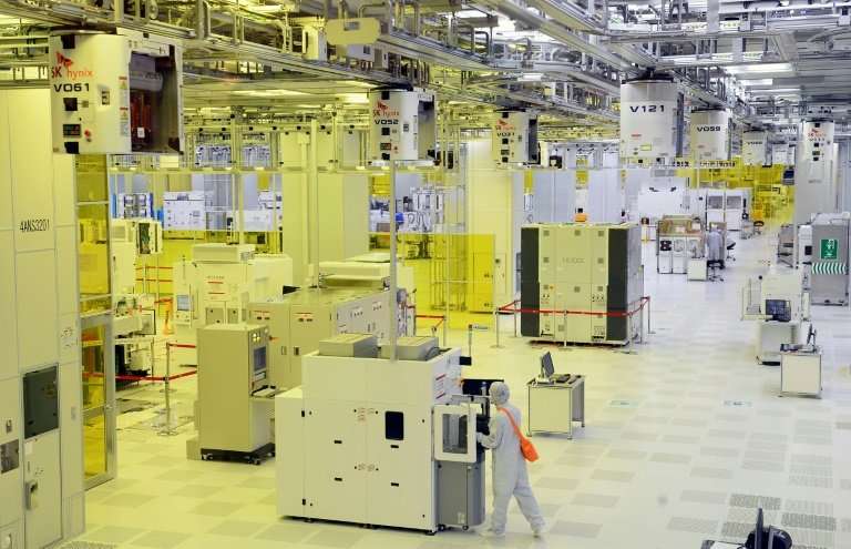 Workers on the operations floor of a plant in Icheon run by SK Hynix, which saw quarterly net profit leap 98 percent year-on-yea