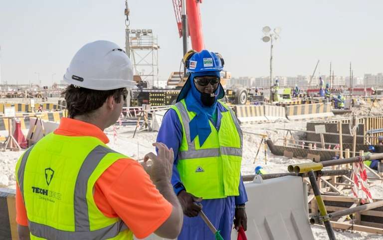 World Cup stadium workers wear &quot;cooling vests&quot; in the Qatari capital Doha
