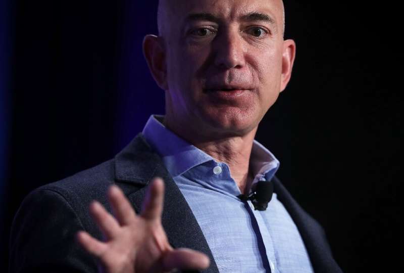 Amazon, whose CEO Jeff Bezos is seen here, posted record profits as it diversified into new areas such as digital advertising an