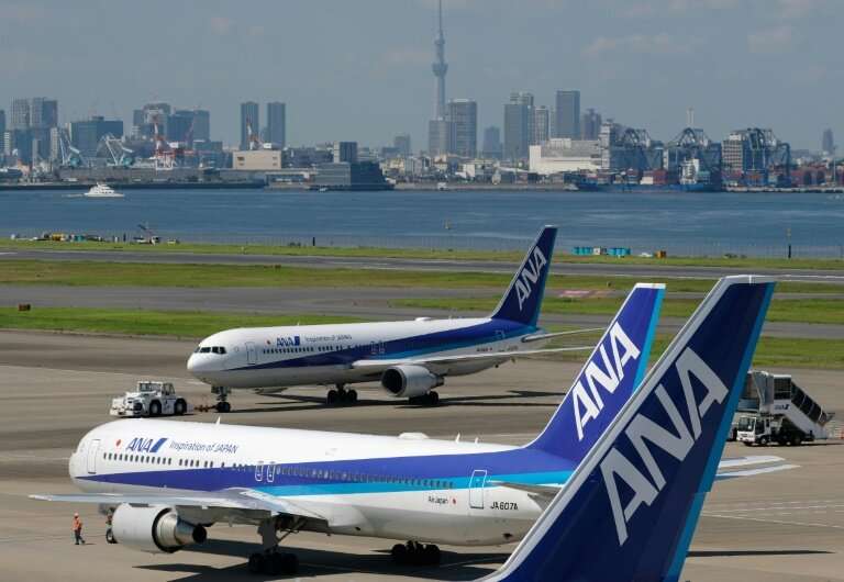 ANA Holdings said it would buy 30 Boeing and 18 Airbus planes, citing growing demand in the region and increased inbound tourism