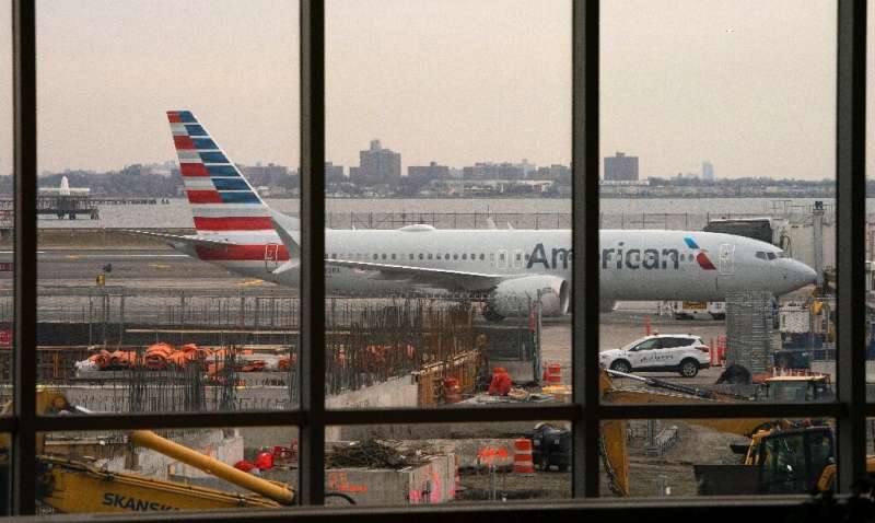An American Airlines 737 Max sits at the gate at LaGuardia airport on March 13, 2019 in New York