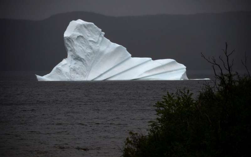 An iceberg floats near King's Point, which is located on Canada's newly christened &quot;Iceberg Corridor&quot;