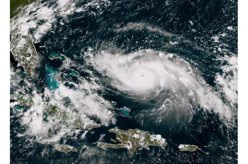 A satellite image shows Hurricane Dorian approaching the Bahamas and Florida on August 30