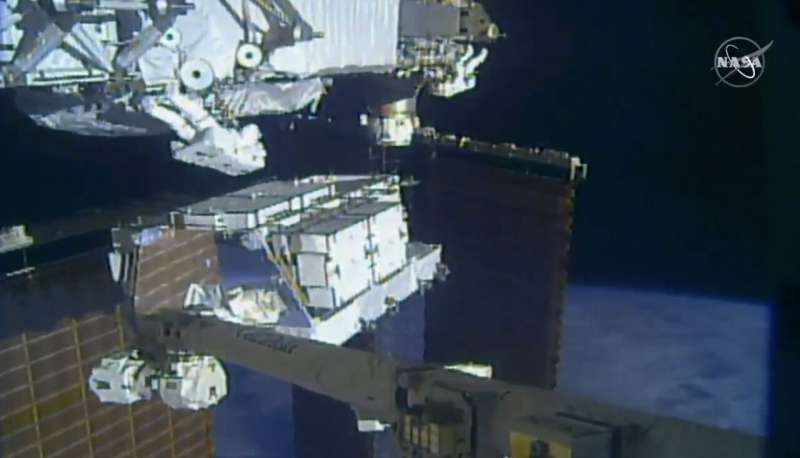 Astronauts replace old batteries in 1st of 5 spacewalks