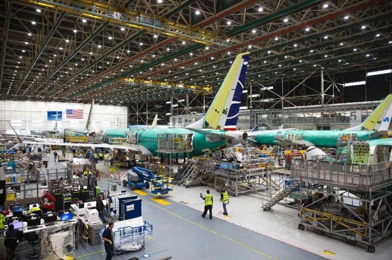 Boeing employees in March 2019 build a 737 MAX in Washington State
