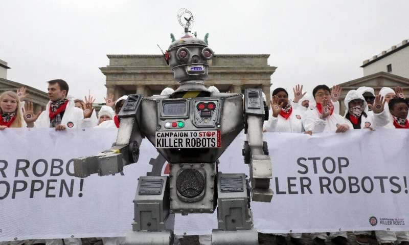 Demonstrators in Berlin take part in a &quot;Stop Killer Robots&quot; campaign organized by German NGO &quot;Facing Finance&quot