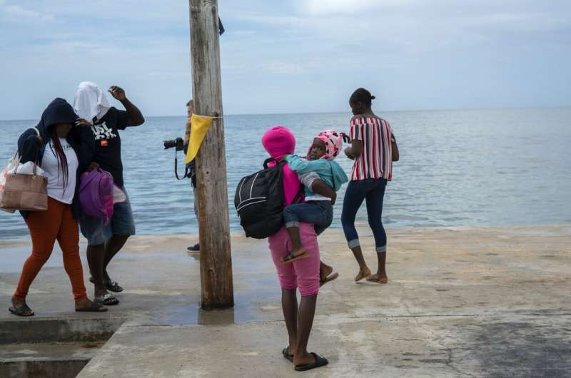 Evacuations begin in Bahamas as Category 4 Dorian bears down