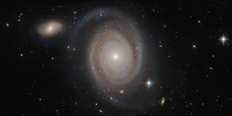 Image: Hubble views a not-so-lonely galaxy